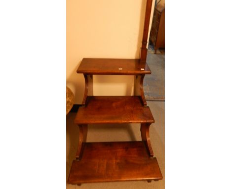 Set of mahogany library steps, three-tier, with turned upright handrail, brass finial, on shaped supports 