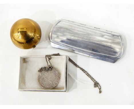 Pygmalian compact in an engine-turned spherical case, in black draw-string bag, a chrome spectacles case and a Marie Theresa 