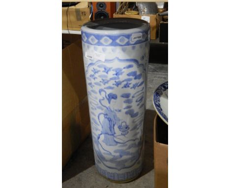 Large ceramic umbrella stand showing Oriental scenes, the large blue and white plate showing windmills in a landscape, assort