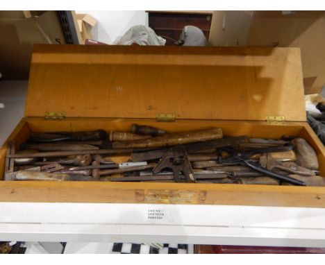Wooden tool box containing tools 