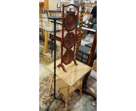 Oak standard lamp with spiral turned column, a mahogany standard lamp with turned column and triform base, a three-tier foldi