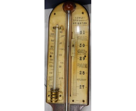 A 19th century mahogany stick barometer, the ivory pediment inscribed 'Rowley, 128 St James's Street, Brighton', with thermom