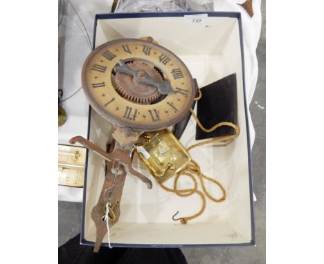 Gilt brass carriage clock, the enamel dial with Roman numerals and a German wooden wall clock of skeleton design, the movemen
