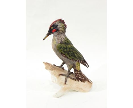 Goebel model of a green woodpecker, printed marks and impressed numbers to base, 28cm high, a Goebel model of a greater spott