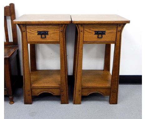 Pair of oak side tables with single frieze drawer, under shelf, on square tapered supports  