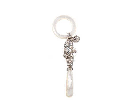 SILVER BABY'S RATTLE,modelled as Mr. Punch, with mother of pearl teething ring handle, 12cm longSurface scratches, nicks and 