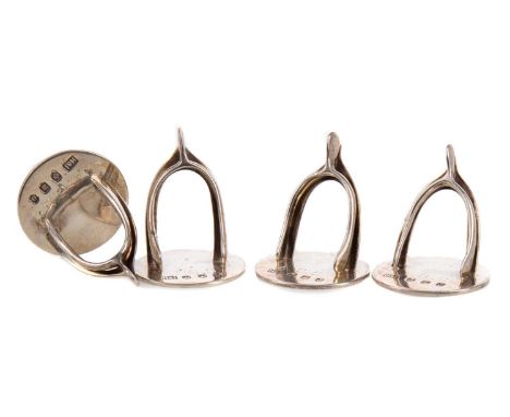 SET OF FOUR GEORGE V SILVER PLACENAME/MENU HOLDERS,maker Hamilton &amp; Inches, Edinburgh 1919, each modelled in the form of 