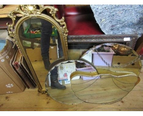 Four mirrors, together with a print set with a clock