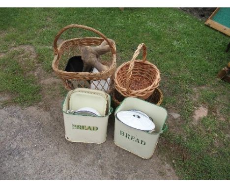 Two enamel bread bins, wicker baskets, etc.