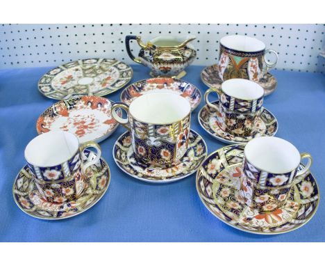 A quantity of Royal Crown Derby and other Imari pattern cups and saucers, and a jugCondition Report:  Jug crazed and cracked,