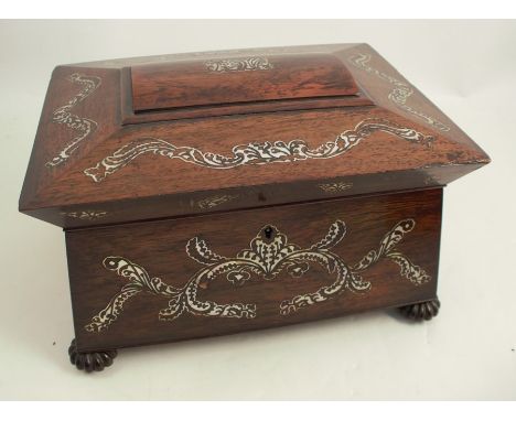A 19th century ladies jewellery box, inlaid with mother of pearl, the interior with lift our tray, raised on gadrooned bun fe