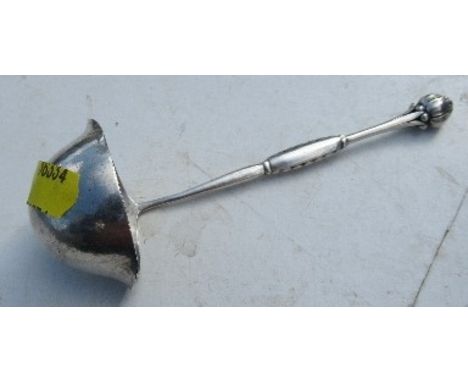 A Georg Jensen silver ladle, with flower bud finial, length 6ins