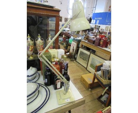 An angle poise lamp