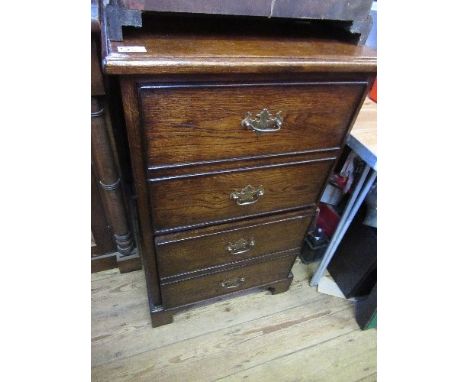 A set of filing drawers together with CD cabinet and another