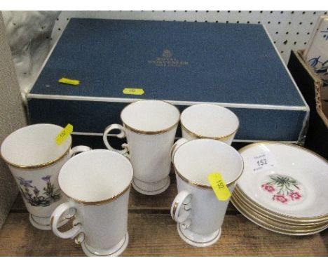 Five Royal Worcester chocolate cups and saucers decorated with flowers, together with boxed Royal Worcester coffee set