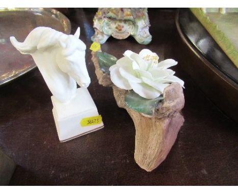 A Royal Worcester model, Chronos, height 4.5ins, together with a Royal Worcester flower on a rock