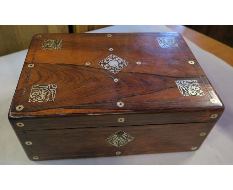 A Victorian rosewood writing box, of rectangular form, the top and front with mother of pearl inlay, the interior fitted with