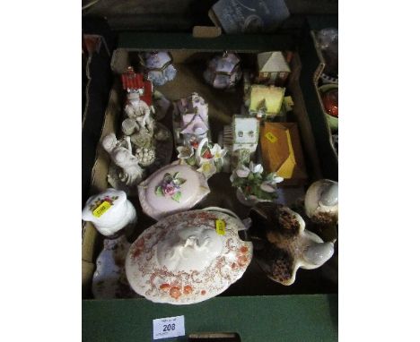 A collection of porcelain models, to include Capodimonte and Coalport cottage examples