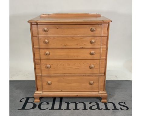 A modern pine chest of five long graduated drawers86cm wide; 101cm highGood overall condition with some old marks and scratch