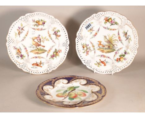 A pair of late 19th century Berlin plates (3)Decorated with birds and flowers 25cm diameter and a royal Worcester plateHeavy 