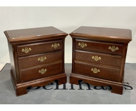 A pair of modern stained beech bedside chests, (2)With three short drawers on bracket feet, 61cm wide; 62cm high