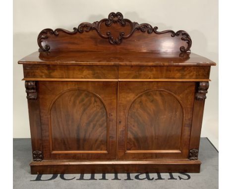 A Victorian mahogany chiffonier with two frieze drawersOver moulded panel doors, 137cm wide; 125cm highMultiple scratches to 