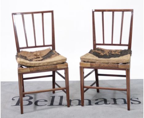 A pair of late George III mahogany inlaid stick back side chairs, (2)On tapering square supports 46cm wide; 87cm high