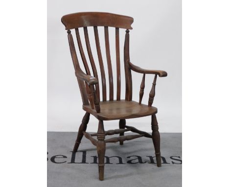 A Victorian ash and elm stick back open armchairOn turned supports, 61cm wide; 111cm high