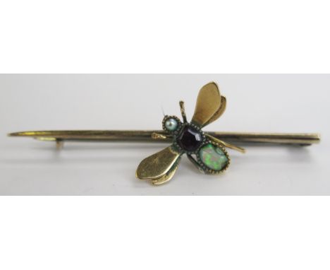 An Antique Opal, Garnet and untested Pearl Insect Brooch on an unmarked precious yellow metal mount, 51mm wide, 3.07g 