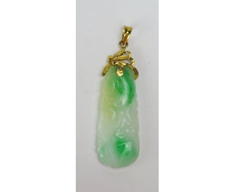 A Carved Jade Pendant in a precious yellow metal mount, stamped 850, 51.8mm drop, 6.33g 