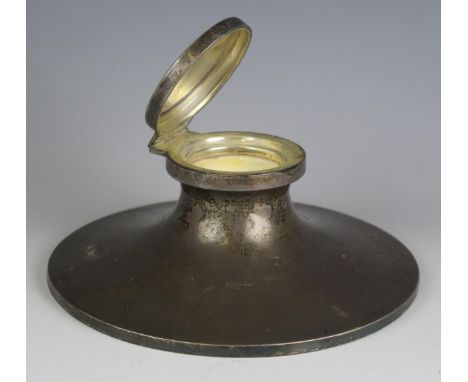 A George V silver capstan inkwell, maker William Neale &amp; Son Ltd, Birmingham, 1925, inscribed, of circular form on a weig