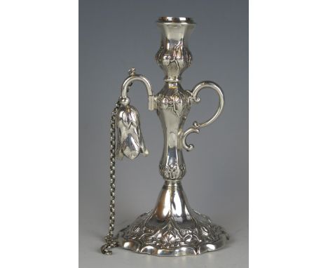 A Victorian silver chamberstick, , maker Henry Wilkinson &amp; Co, Sheffield, 1851, with urn-shaped sconce on floral decorate