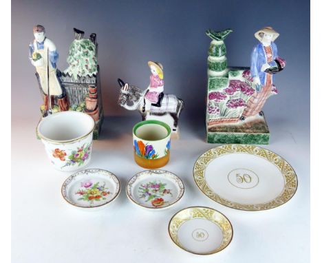 A pair of Rye Pottery figures, 'Lady Gardiner' and 'Gardiner', together with a girl on a pony, a Dresden porcelain planter an