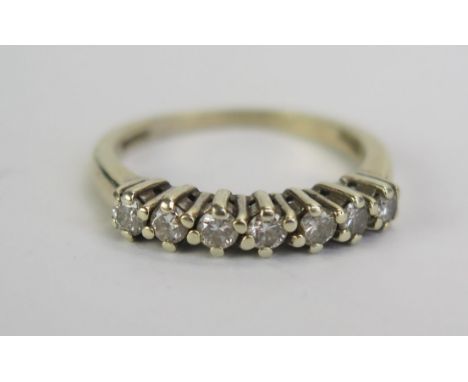 A 9ct White Gold and Diamond Half Eternity Ring, continental marks, .33ct, size K.5, 2.52g 