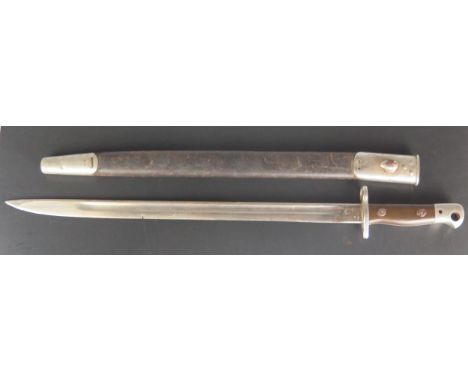 A 1907 pattern British bayonet by Wilkinson, with 43cm fullered blade, Bakelite grips, contained in a leather and metal bound