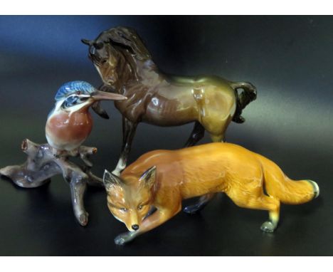 Beswick, model of a trotting stallion,  a model of a fox and an Austrian model of a Kingfisher. (3). 