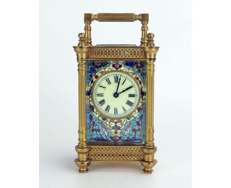 A late 19th century French gilt brass and champlevé enamel travelling timepiece, with 4.5cm Roman dial enclosed in an enamel 
