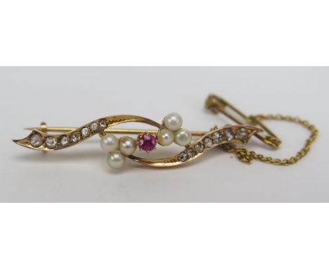 A 15ct Gold, Old Cut Diamond, Ruby and untested Pearl Brooch, 41.6mm, stamped 15, 4.25g 