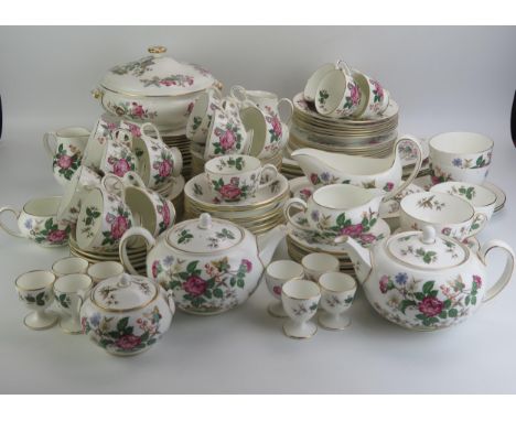 An extensive Wedgwood tea and dinner service with polychrome "Charnwood" pattern decoration, includes tureens and covers, gra