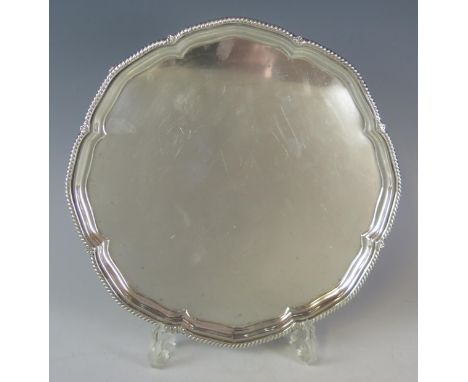 A George V silver salver, maker Harrison Brothers &amp; Howson, Sheffield, 1929, of lobed circular form, with gadrooned borde