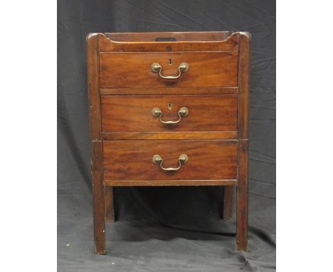 A Georgian mahogany converted commode, with tray top and three short drawers, raised on chamfered block supports, 53cm wide. 