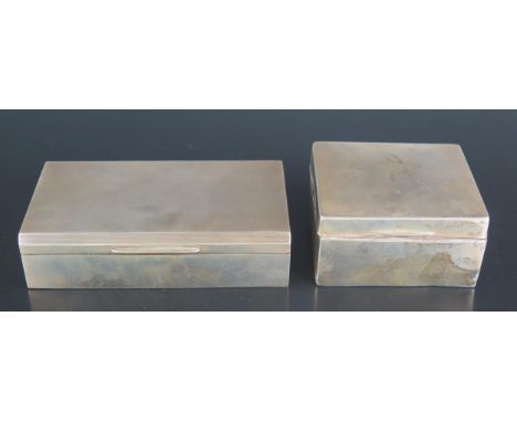 A George VI silver cigarette box, makers mark worn, London, 1950, of rectangular outline with engine turned decoration, 15.5c