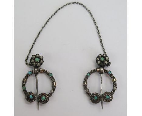 A 19th Century French Cloak Pin in silver and precious yellow metal inset with untested pearls and turquoise, marked to both 