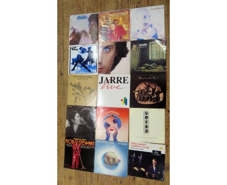 A collection of 1990's LP records, various artists including Sinead O'Connor, Stevie Wonder, Suede, Tina Turner, John Lennon,