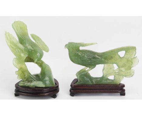 A Chinese model of pheasant, mounted on a polished wood base, 15.5cm long, together with another of a finch perched on a bran