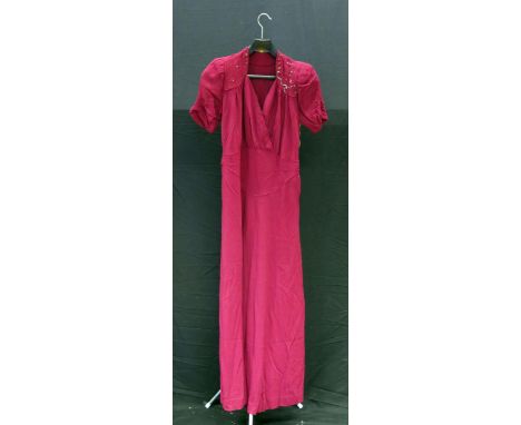 A 1930's/40's wine red cocktail dress, with padded shoulders, embroidered collar panels, pleated V-neck, with waist belt. 