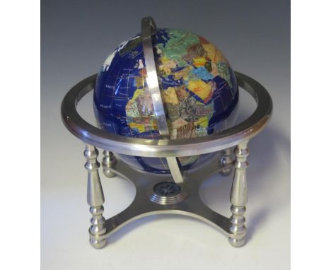 A 20th century table top terrestrial 8ins  globe the continents outlines inlaid with mother-of-pearl and specimen marbles, to