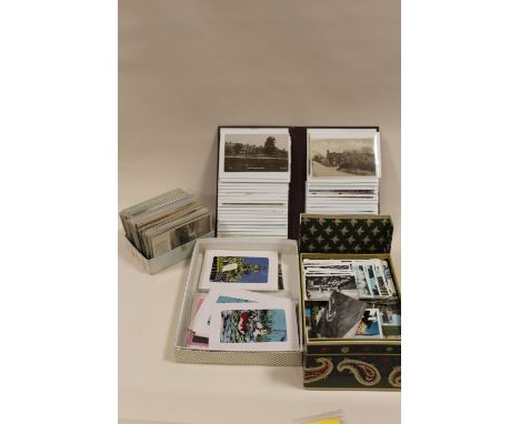 A COLLECTION OF VINTAGE AND ANTIQUE POSTCARDS TO INCLUDE AN ALBUM 