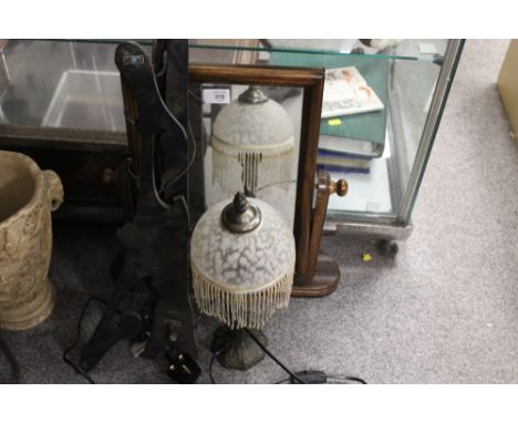 A SWING MIRROR TOGETHER WITH A LAMP AND EBONISED RACKING (3)