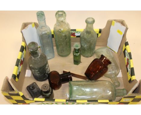 A TRAY OF VINTAGE GLASS BOTTLES 